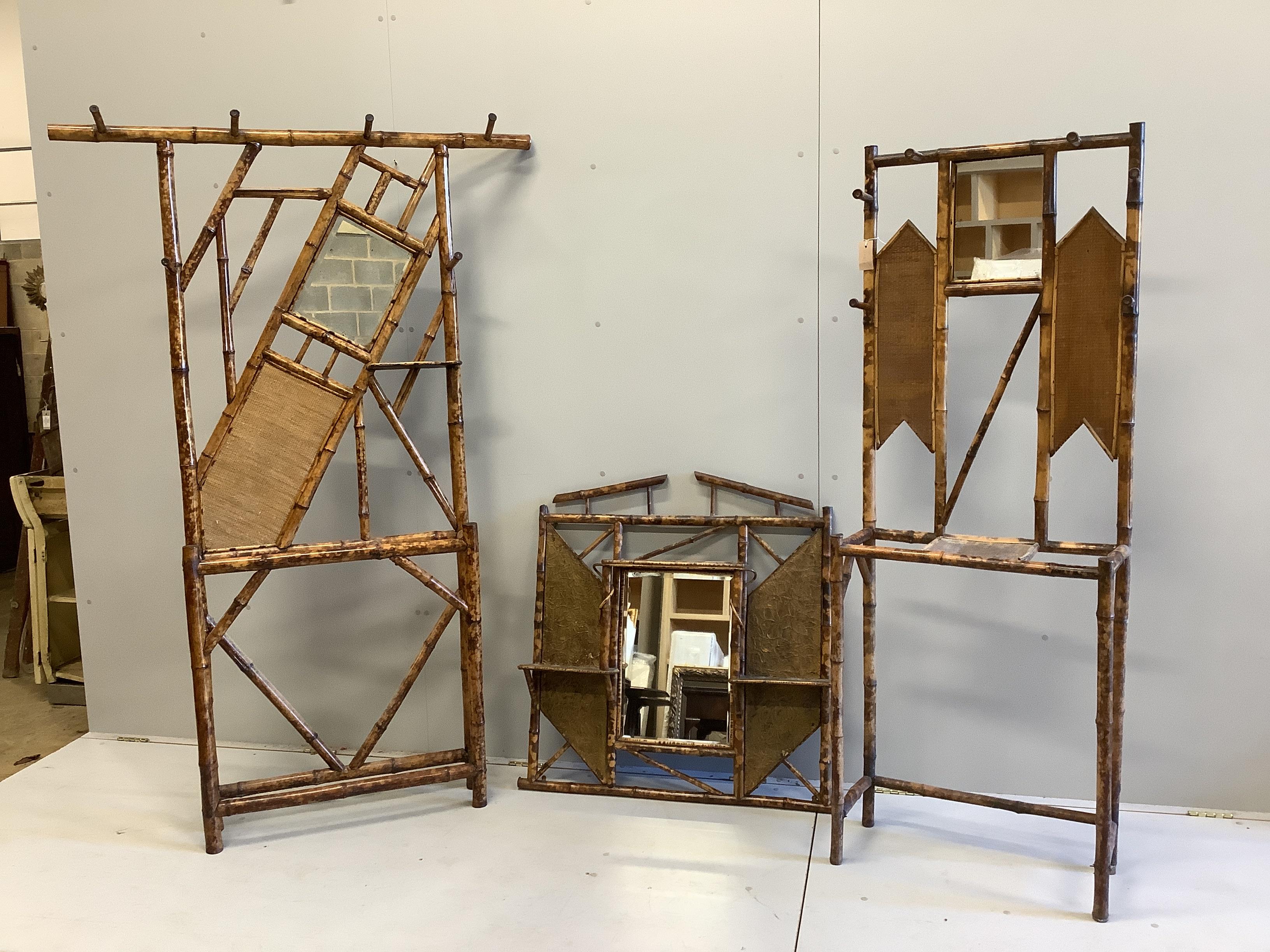 Two late Victorian bamboo hallstands and a bamboo wall mirror, largest width 120cm, height 186cm